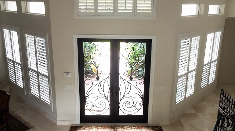 Atlanta foyer with glass doors and plantation shutters